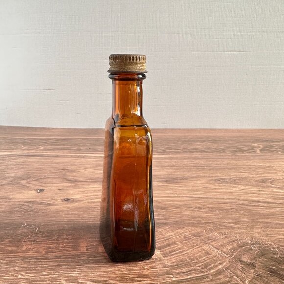 Vintage Crown Colony Guitar-Shaped Amber Glass Bottle With Brass Lid 4 1/2" Tall - Picture 2 of 10